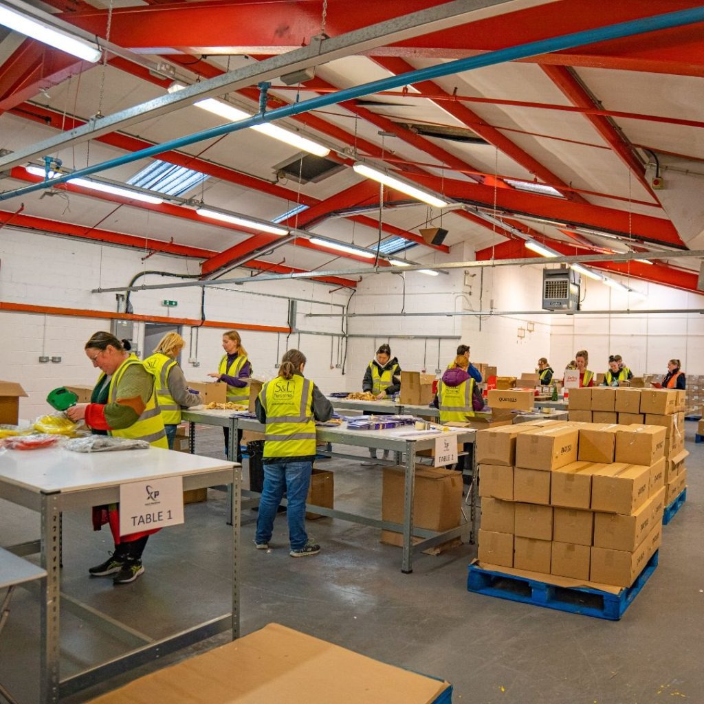 Xact Packing team at work on the packing floor
